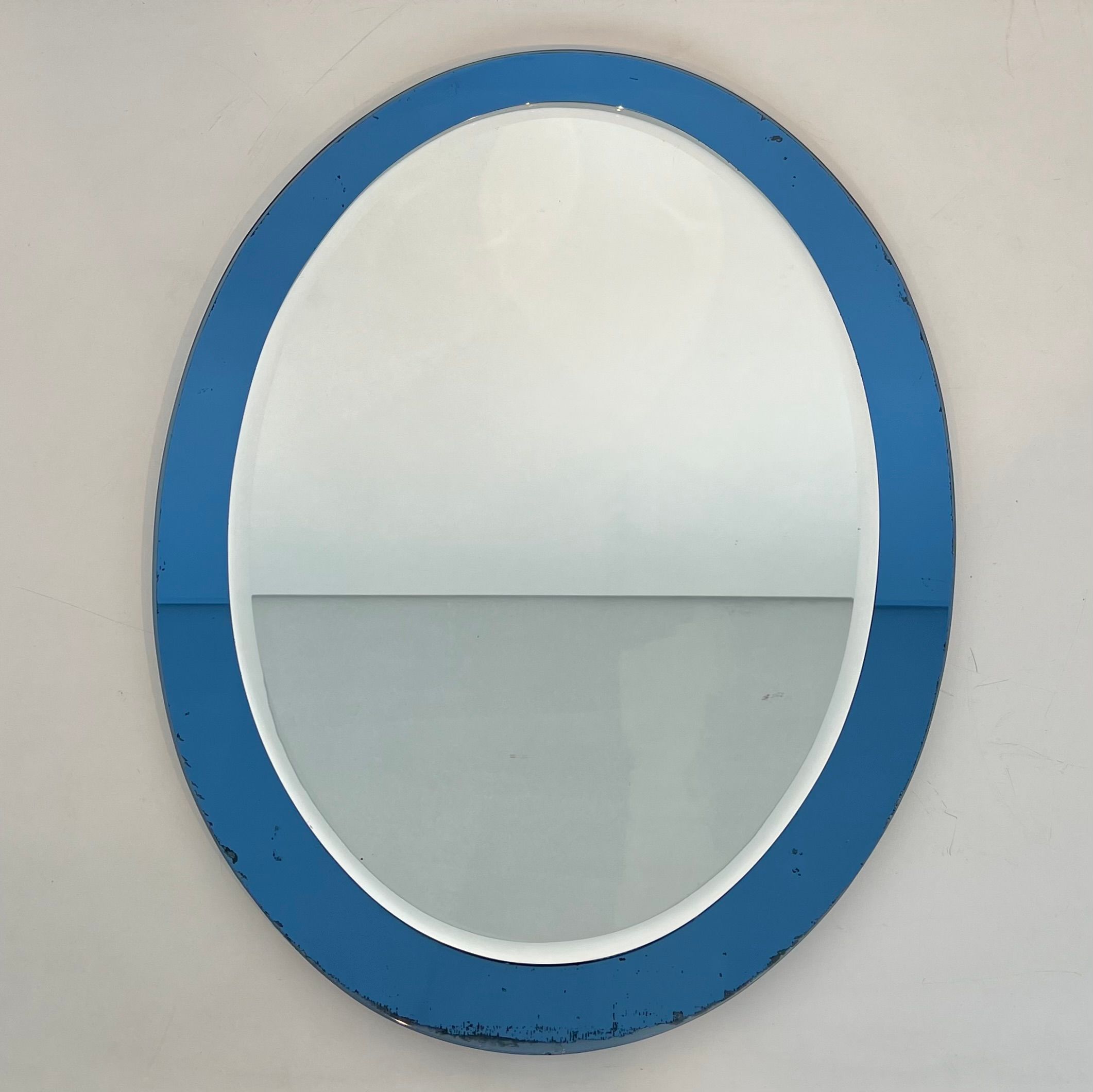 Oval-Shaped Mirror with a Bluish Surround by Fontana Arte
