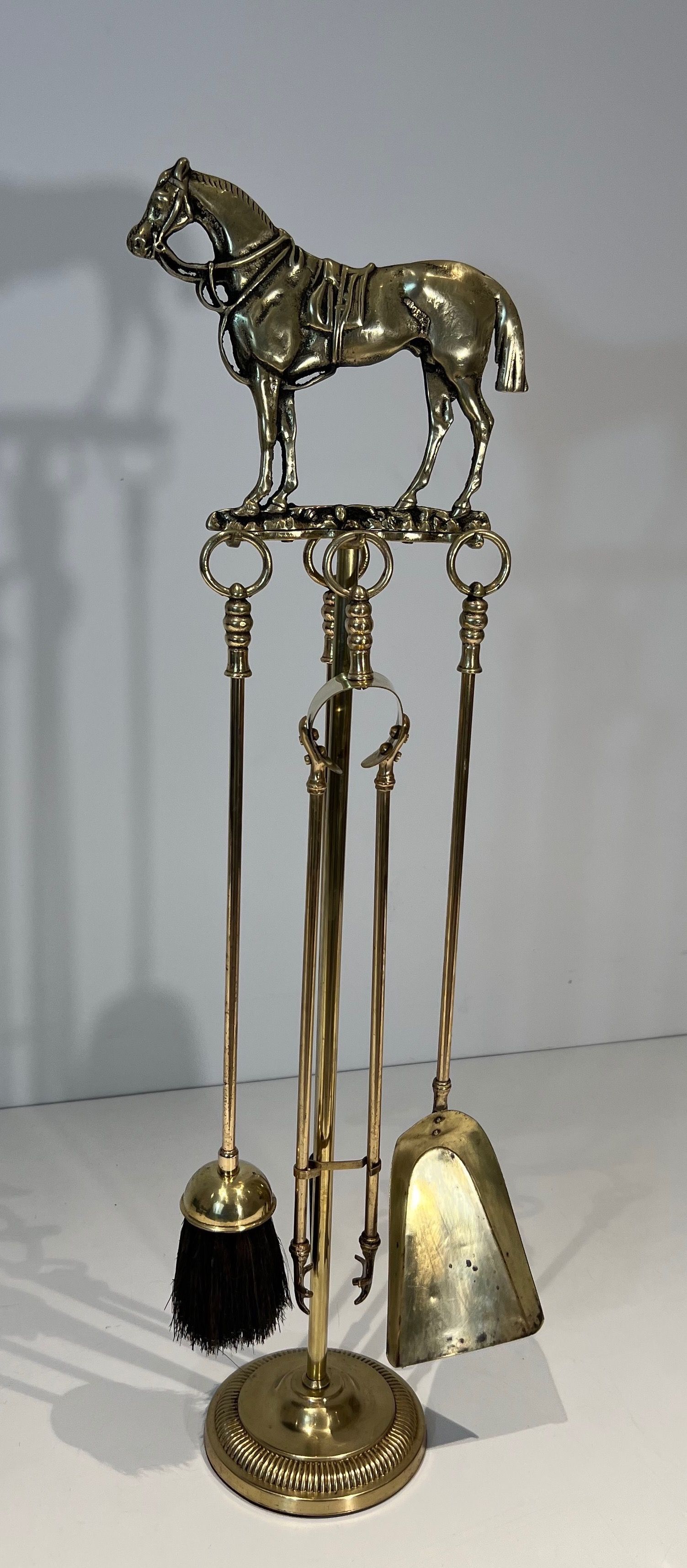 Brass Fireplace Tools Surmounted by a Sculpture representing a Horse