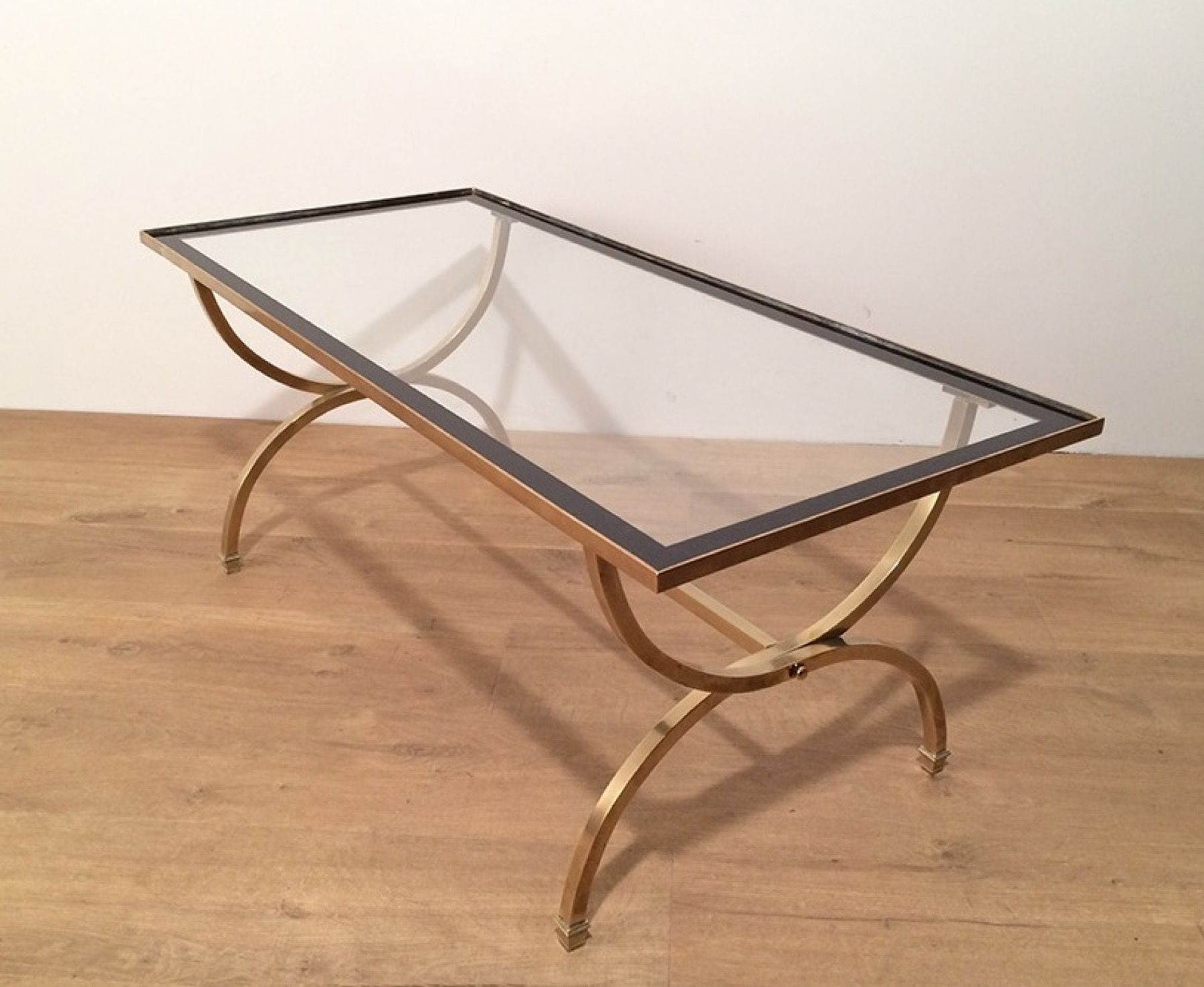 Brass Coffee Table with Clear Glass Top Surrounded with Black Lacquered Edges by Maison Jansen