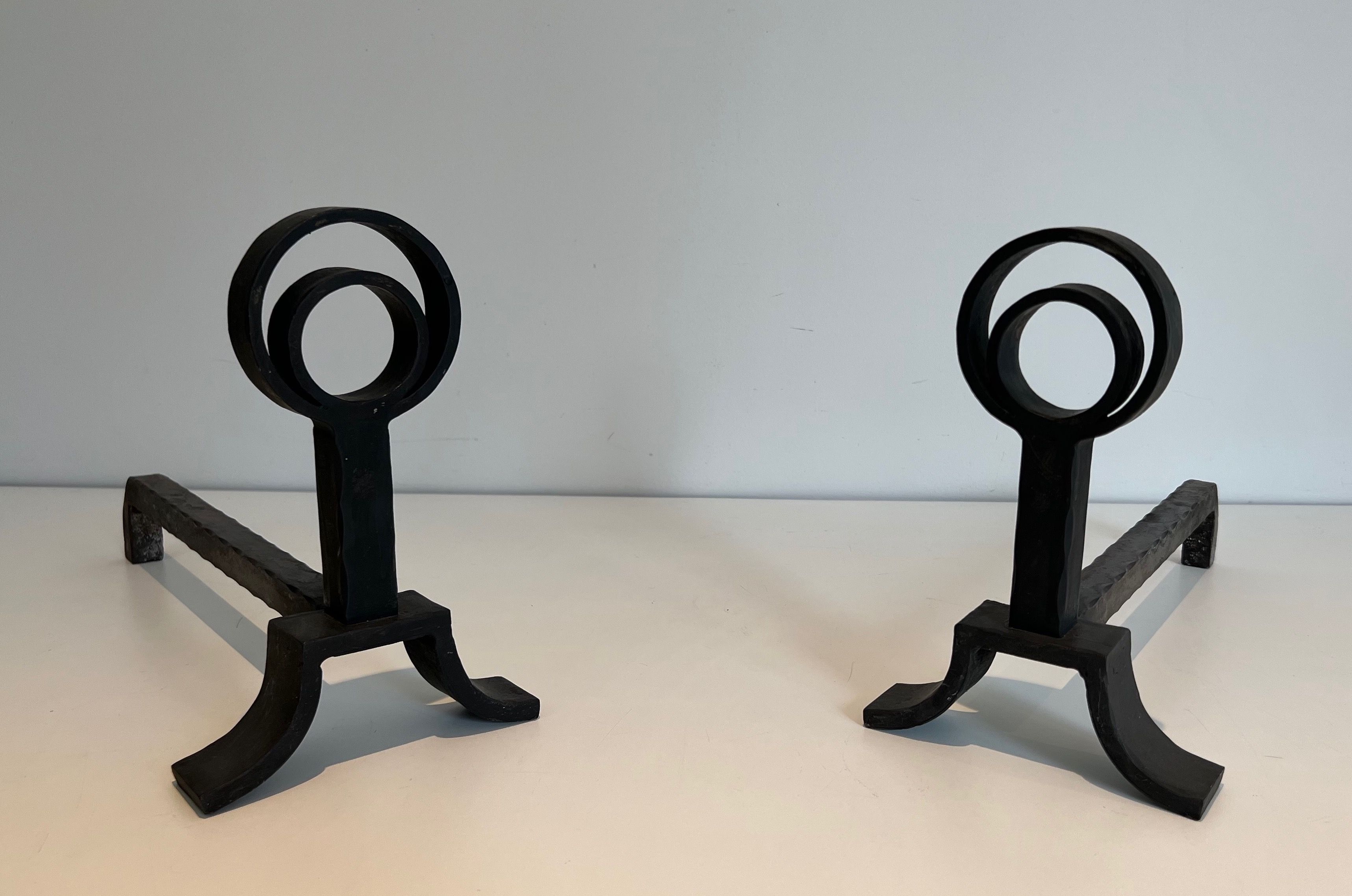 Pair of Modernist Cast Iron and Wrought Iron Andirons in the Style of Jacques Adnet