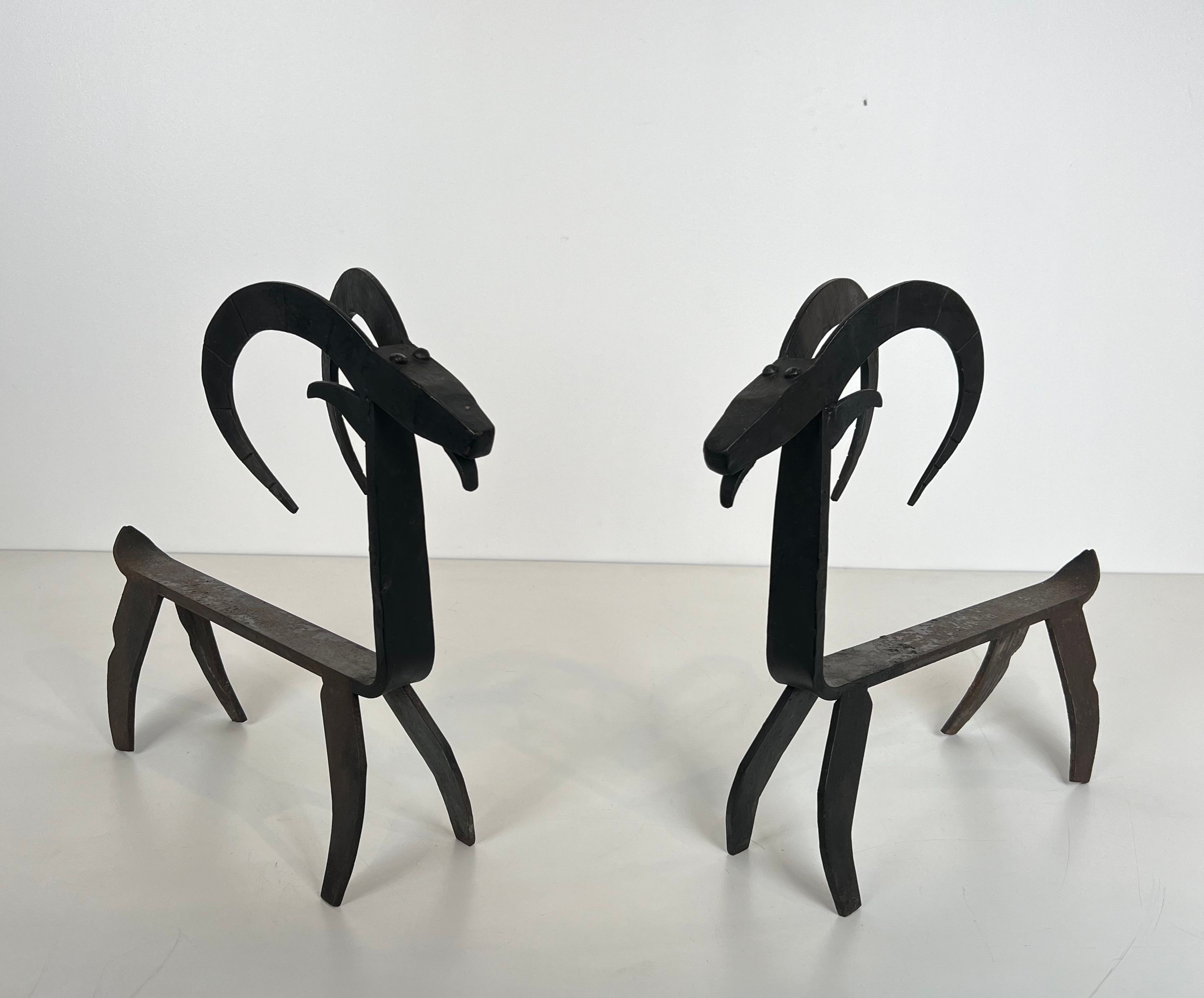 Pair of Goat Wrought Iron Andirons In the style of Edouard Schenck