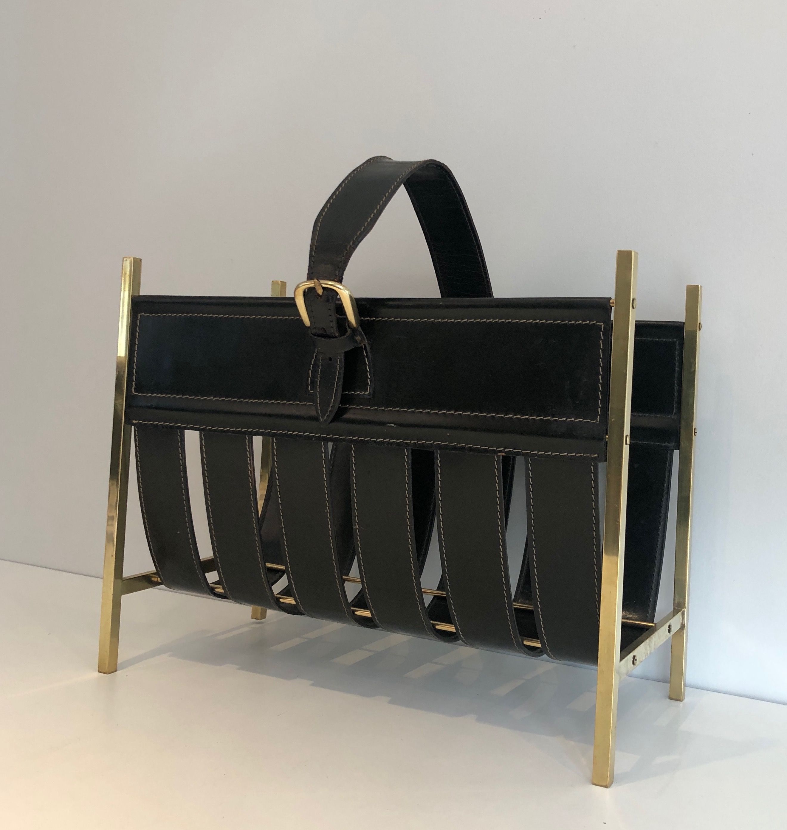 Hand-Bag Brass and Leather Magazine Rack by Jacques Adnet. Circa 1940