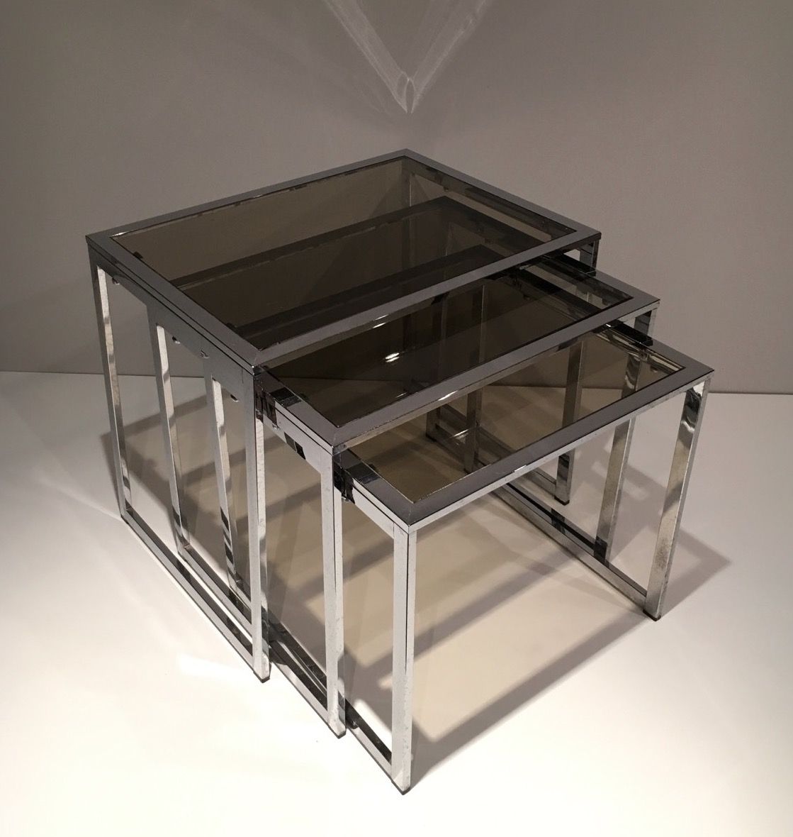 Set of 3 Chromed Nesting tables. Circa 1970