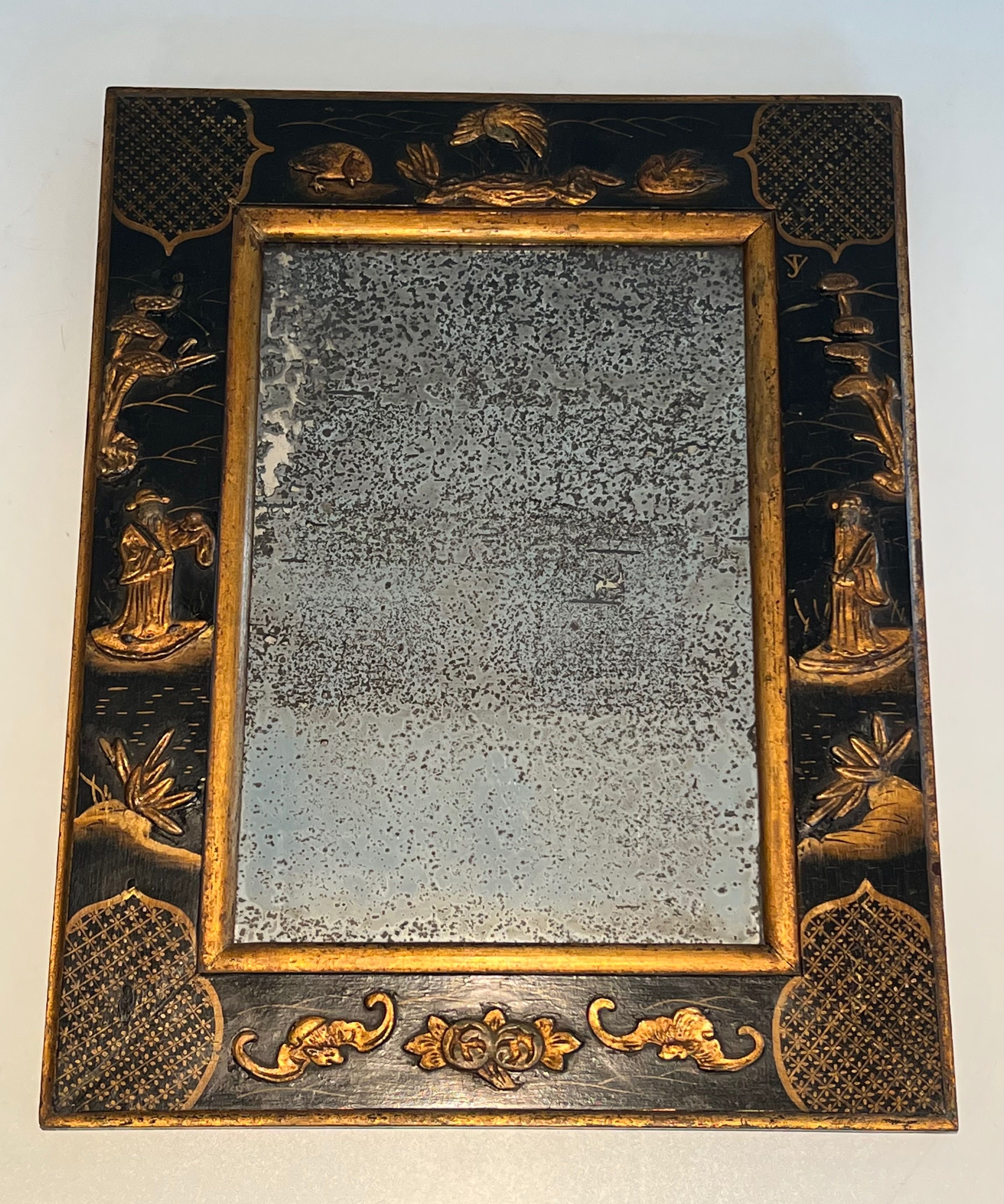 Lacquer and Gilding Mirror with Chinese Scenes in the style of Maison Jansen. Circa 1940