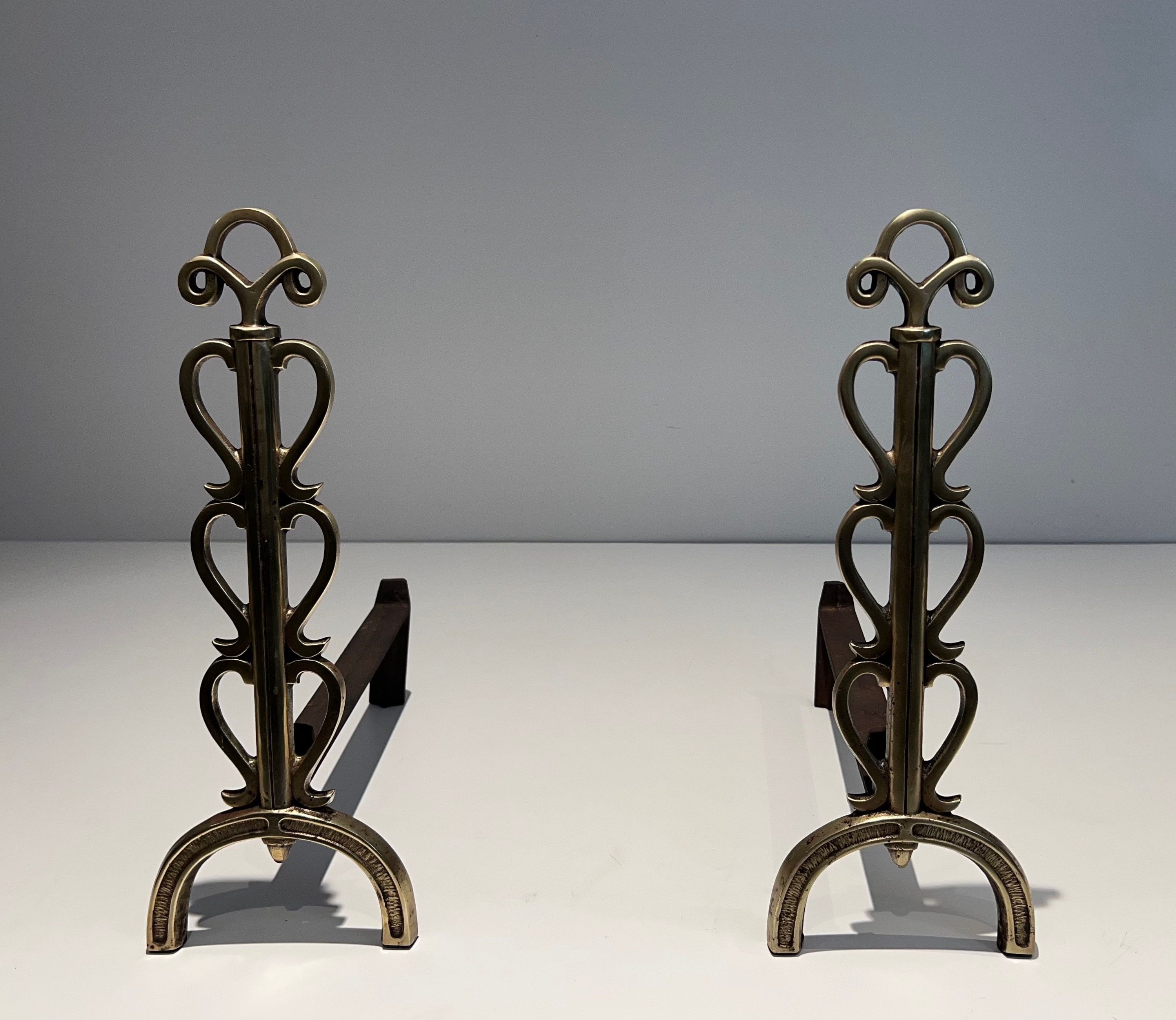 Pair of Brass Andirons in the Style of Raymond Subes