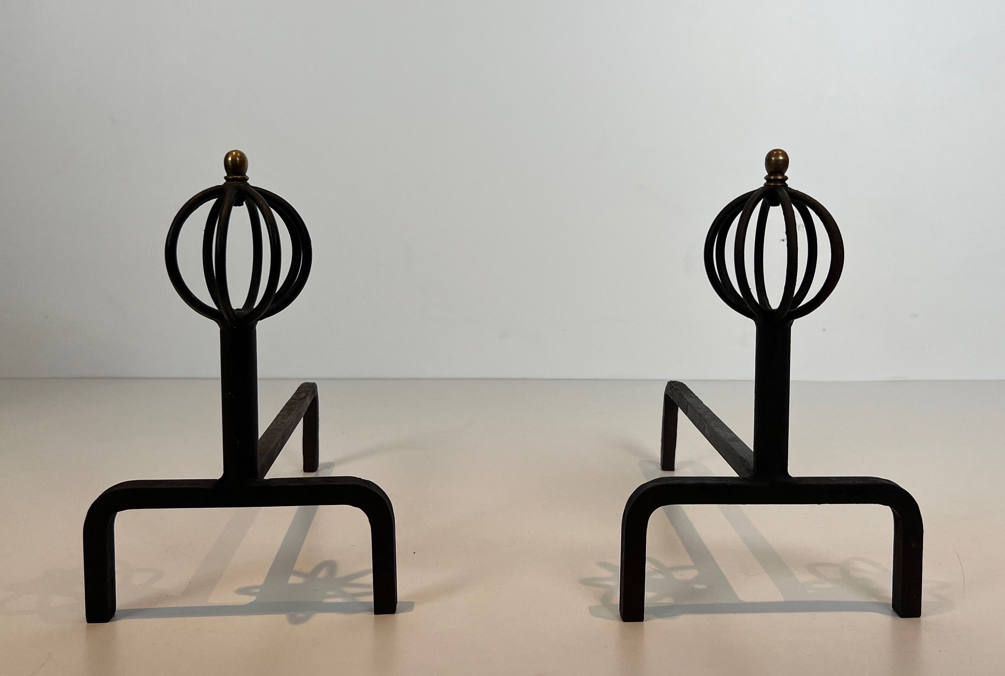 Pair of Wrought Iron Andirons in the Style of Jean Royère