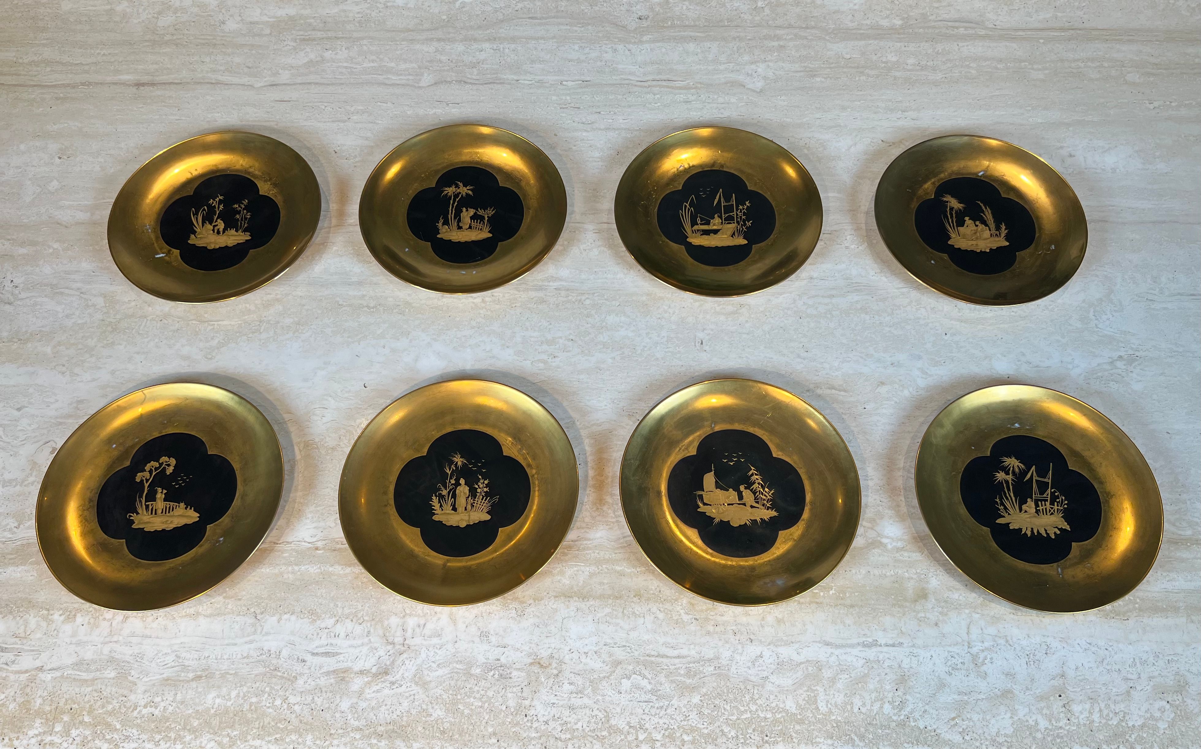 Set of 8 Gilt Porcelain Plates with Gilt Chinoiserie Decoration on a Black Ground, Signed Delvaux Paris