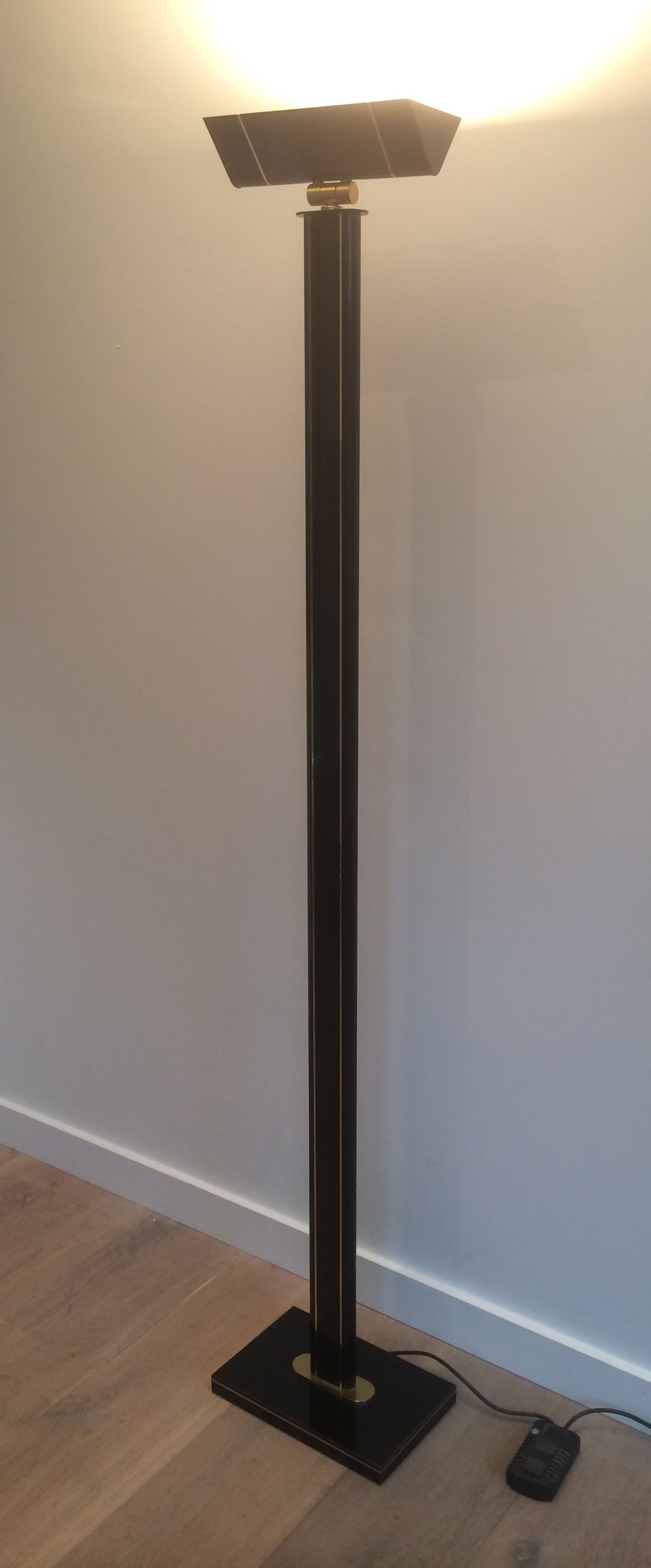 Black lacquered and brass floor lamp