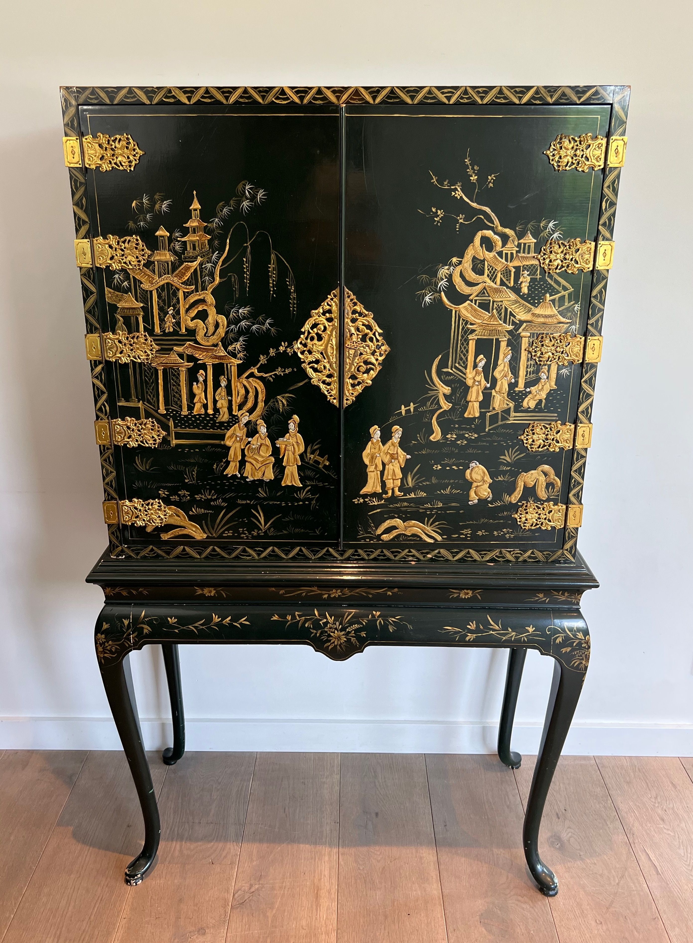 Chinese Lacquered and Gilt Cabinet