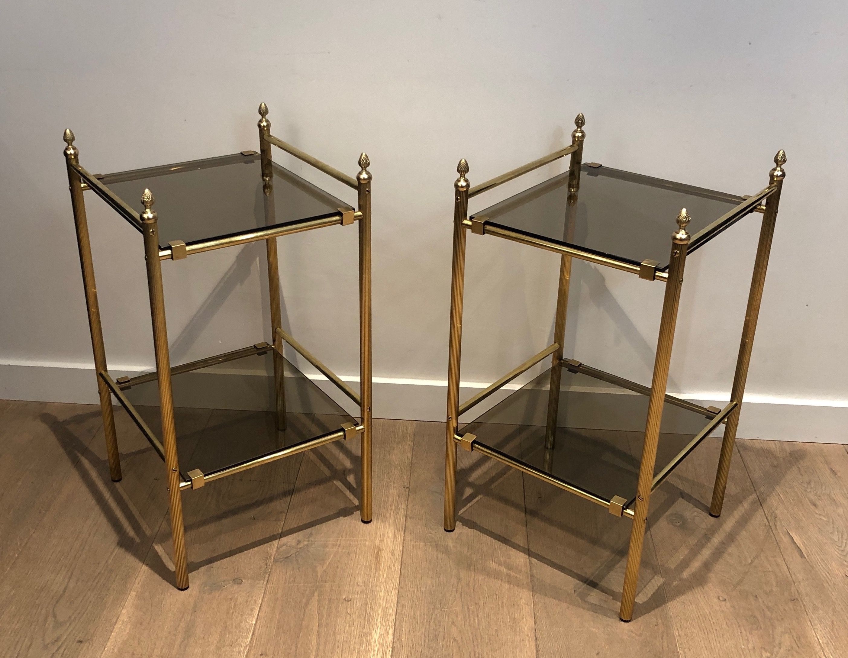 Pair of Brass Side Tables with Smoked Glass Shelves In the style of Maison Jansen