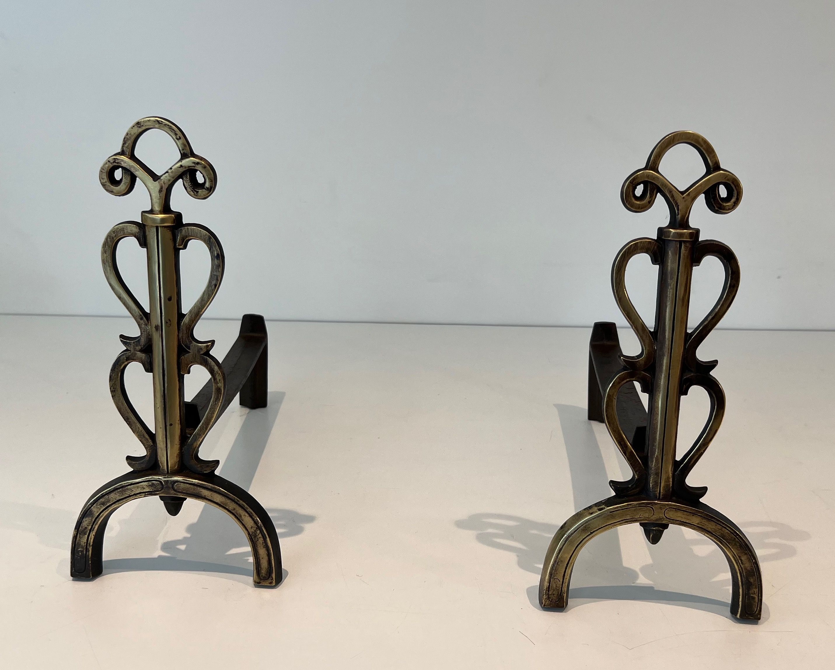 Pair of Brass Andirons in the Style of Raymond Subes