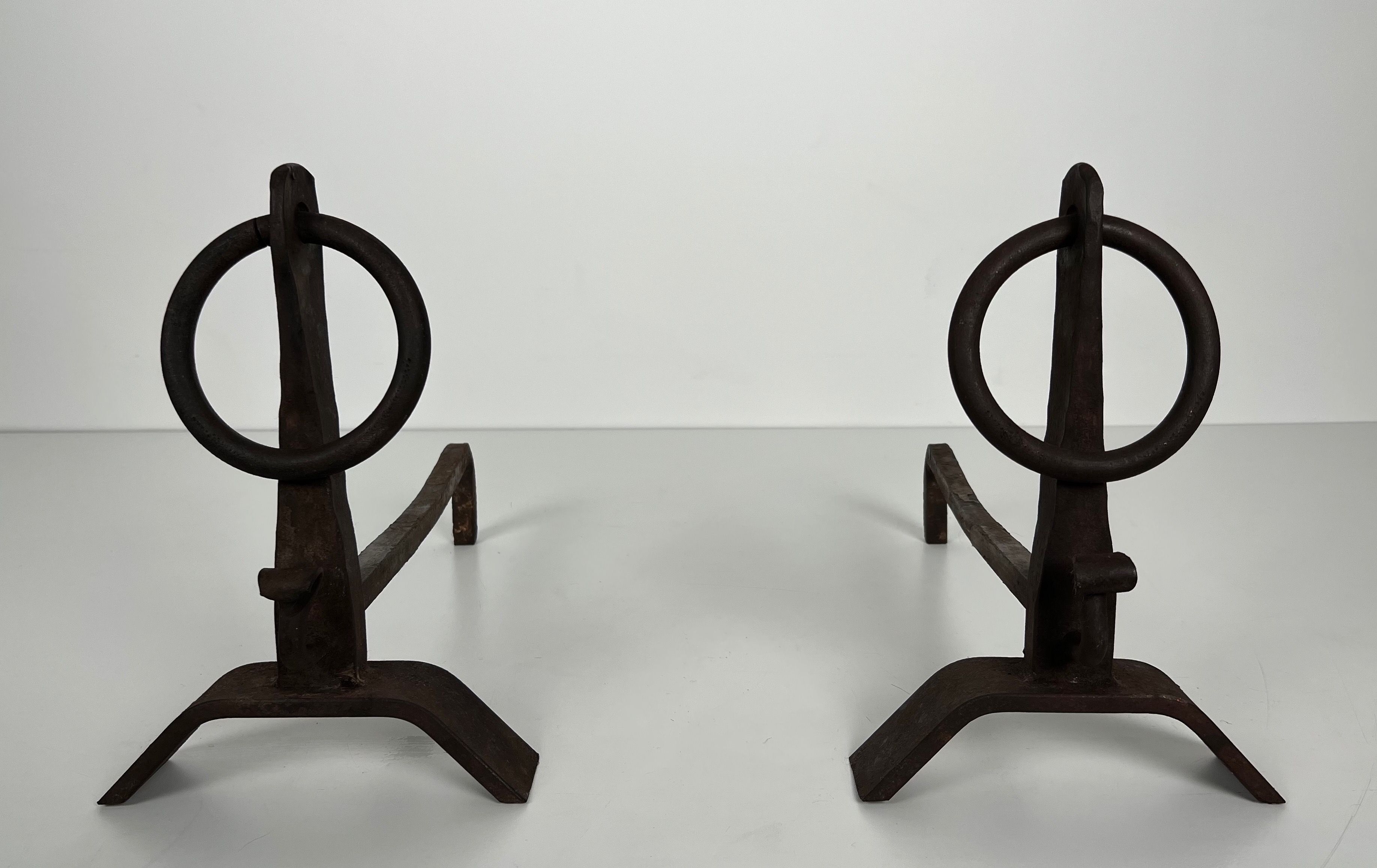 Pair of Modernist Wrought Iron Andirons in the Style of Jacques Adnet