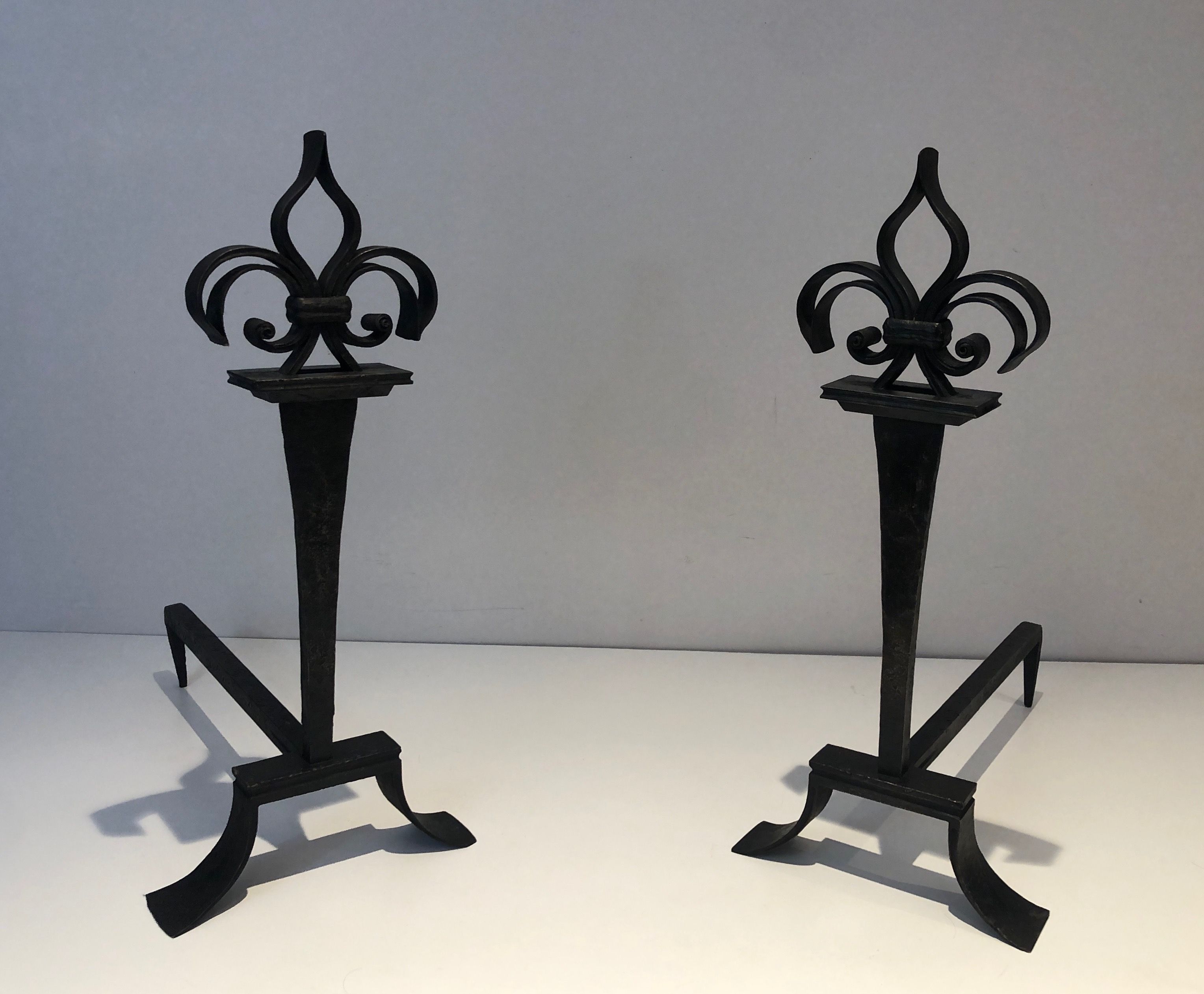 Important Pair of Wrought Iron Andirons with a Lily Flower