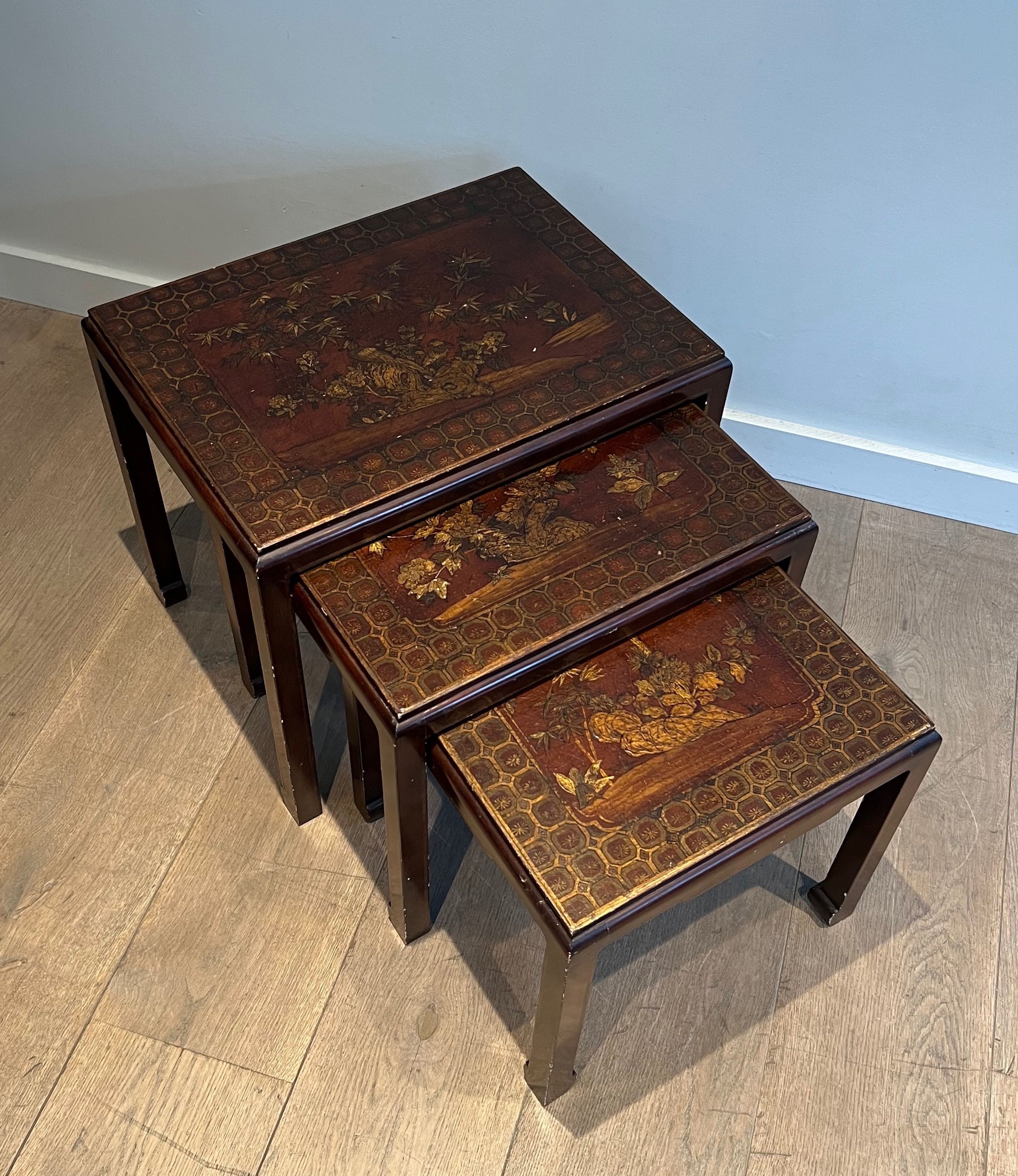 Set of Three Lacquered Nesting Tables with Chinese Scenes. Circa 1940