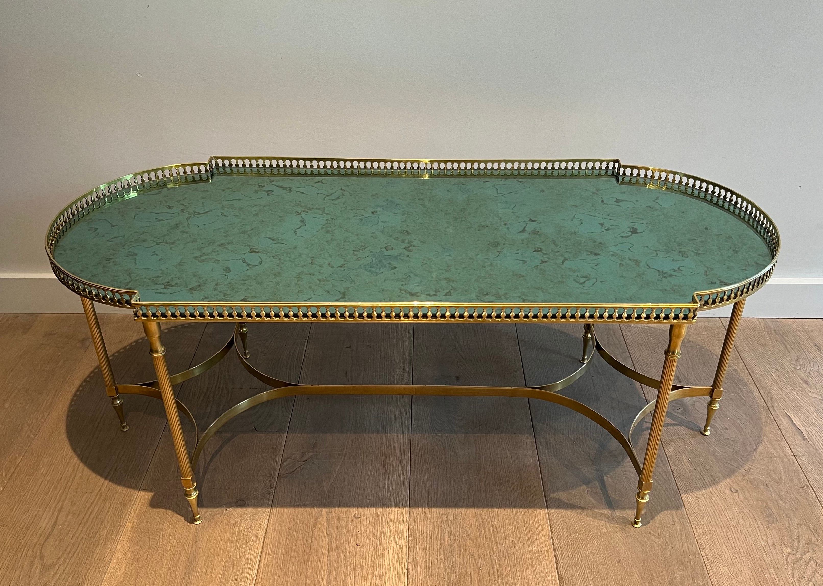 Neoclassical Style Brass Coffee Table in the style of Maria Pergay. Circa 1940