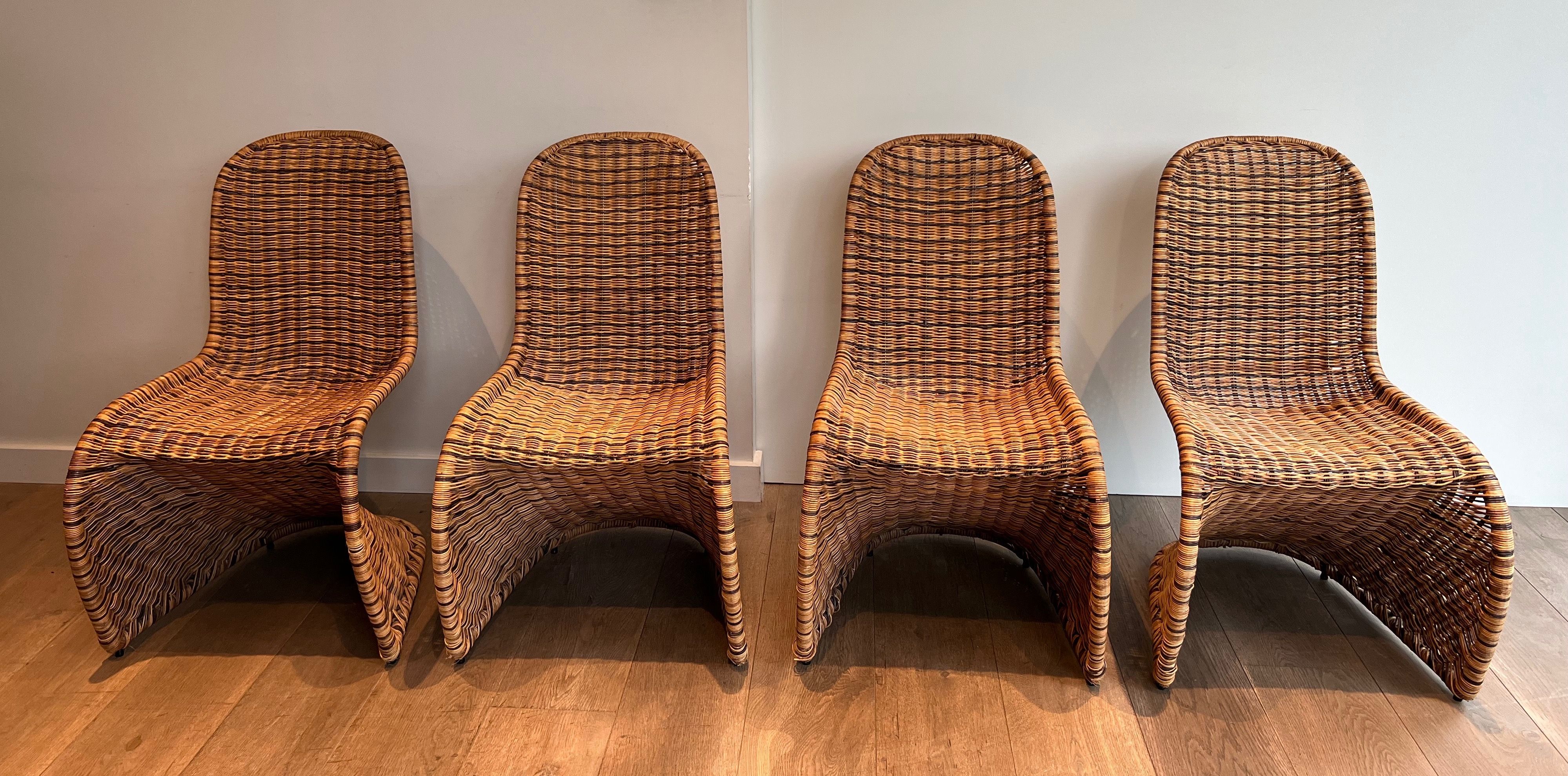 Set of Four Curved Rattan Chairs