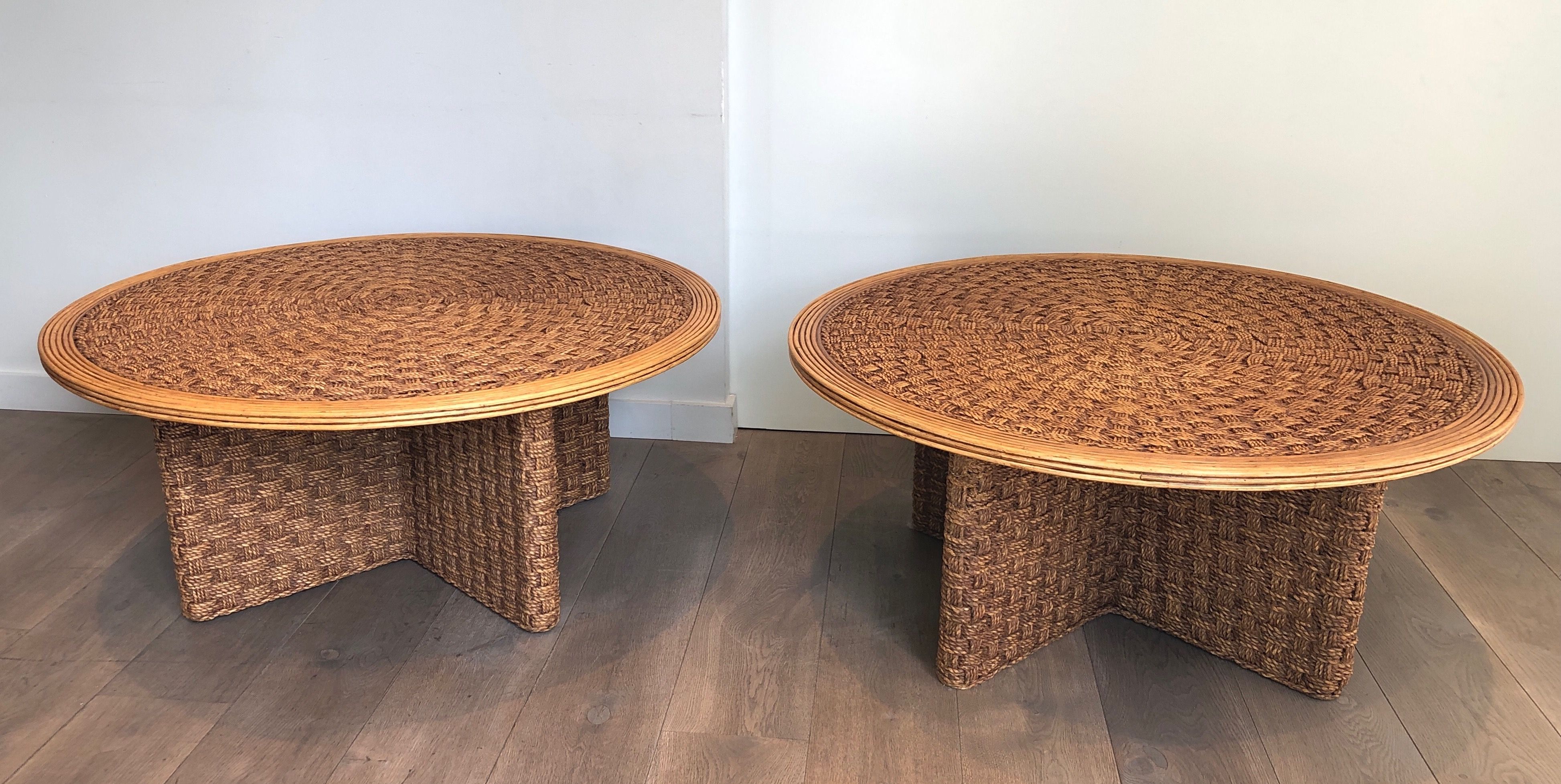 Pair of large round rope and wood coffee table in the style of Audoux Minet