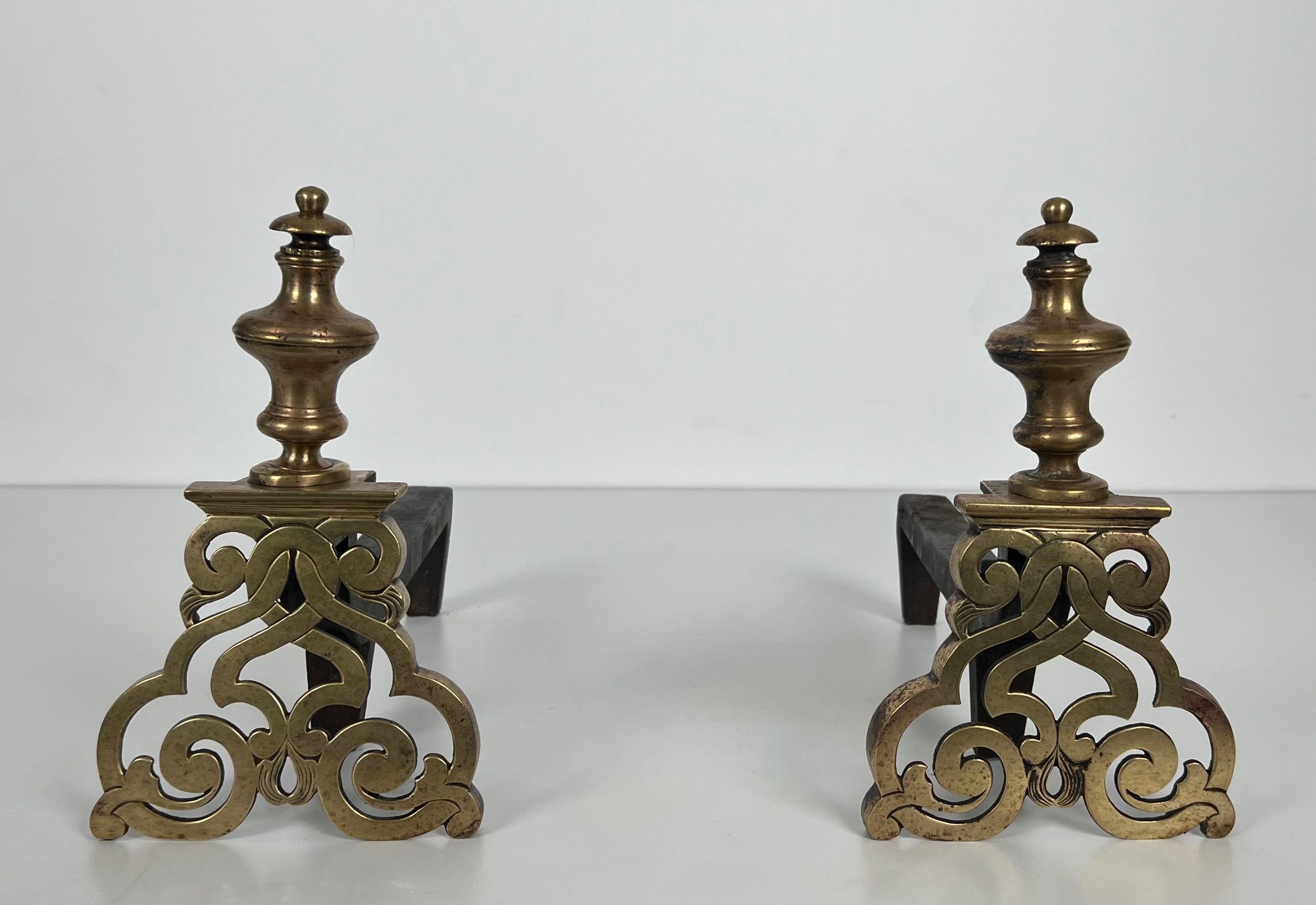 Pair of Chiseled Bronze Andirons