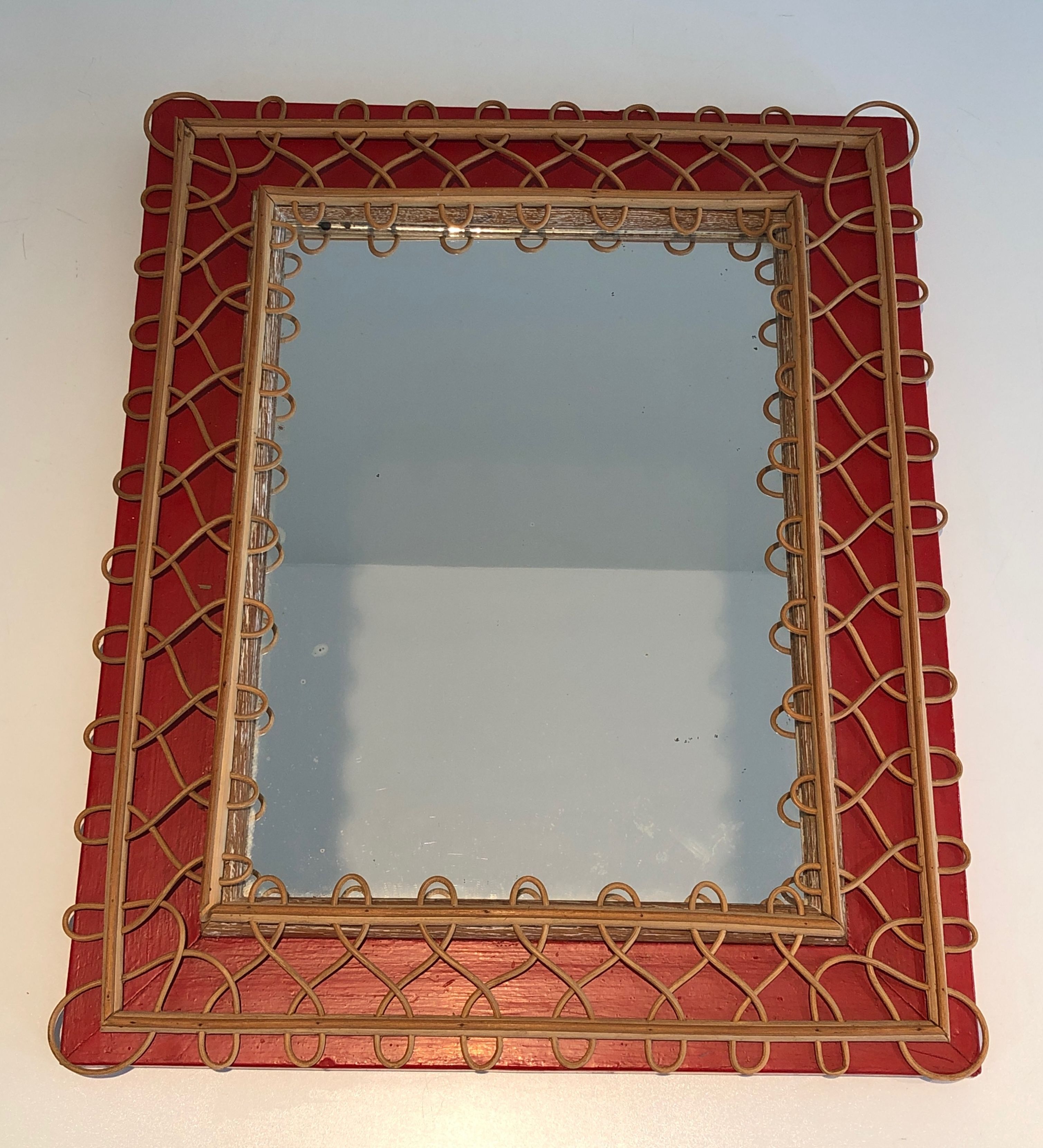 Rattan Mirror on Red Background
