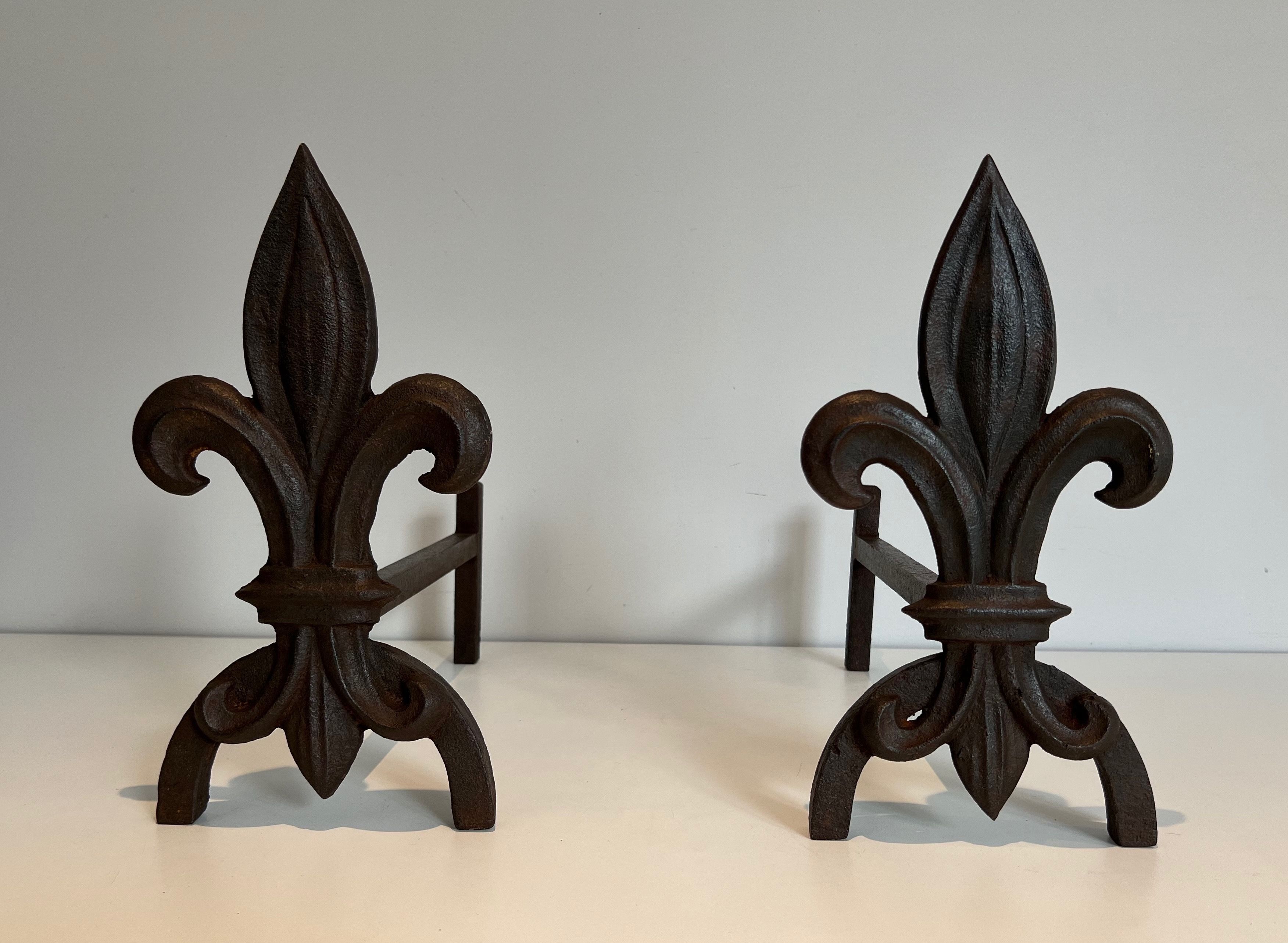 Pair of Fleurs de Lys Cast Iron and Wrought Iron Andirons