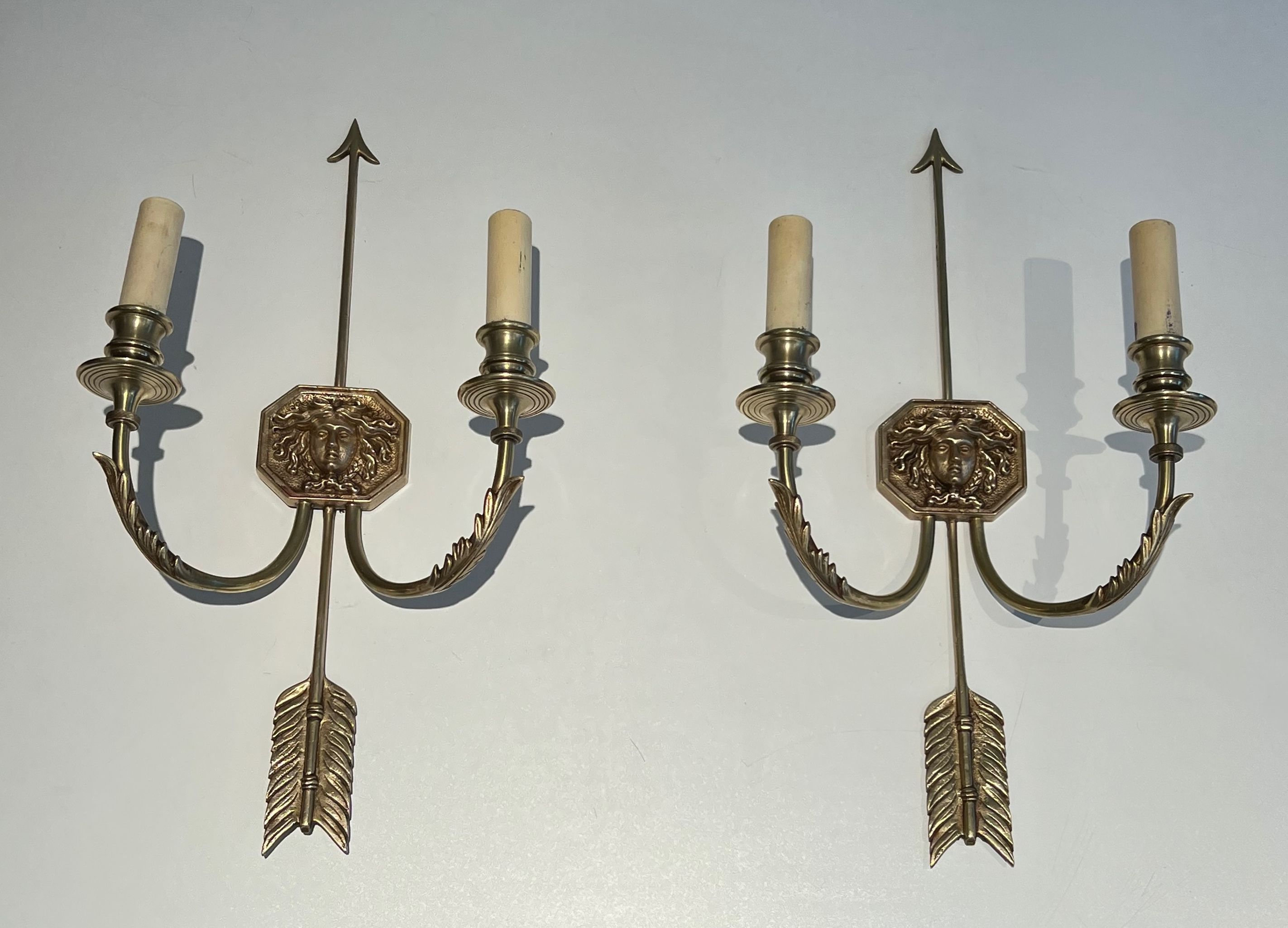 Pair of Bronze Wall Sconces with Arrows with the Effigy of the Sun King by Louis Gau