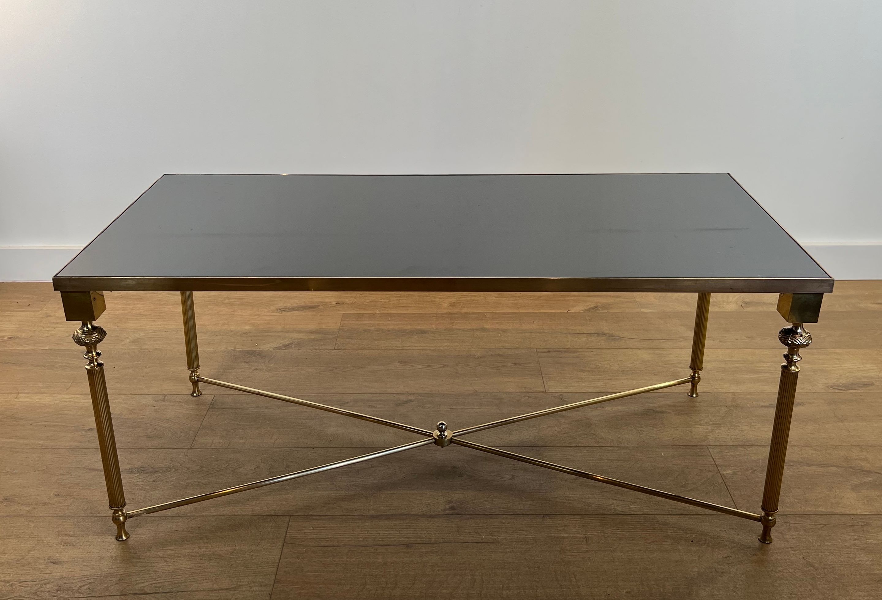 Brass Coffee table with Black Lacquered Glass Top in the style of Maison Jansen