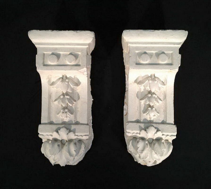 Pair of plaster elements.