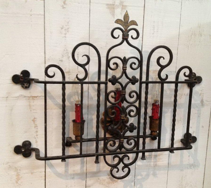 Beautiful Wrought Iron Wall Light. French work. Circa 1940