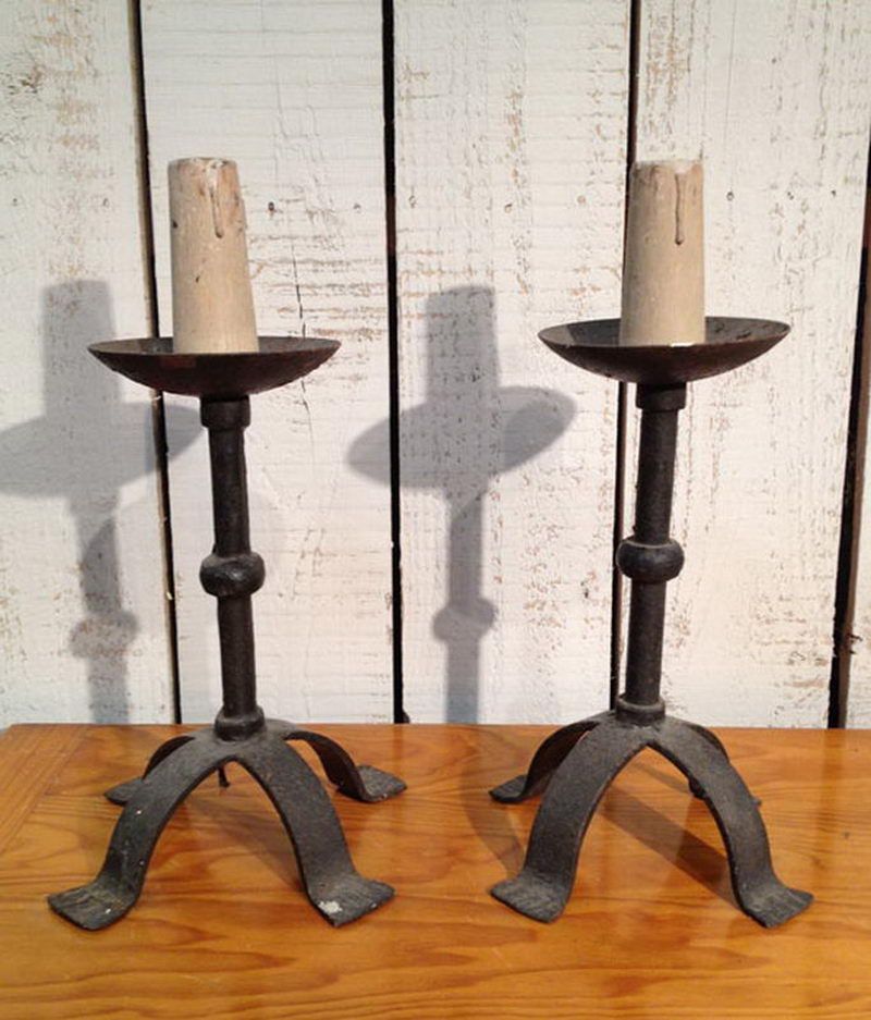 Pair of wrought iron candelabras.