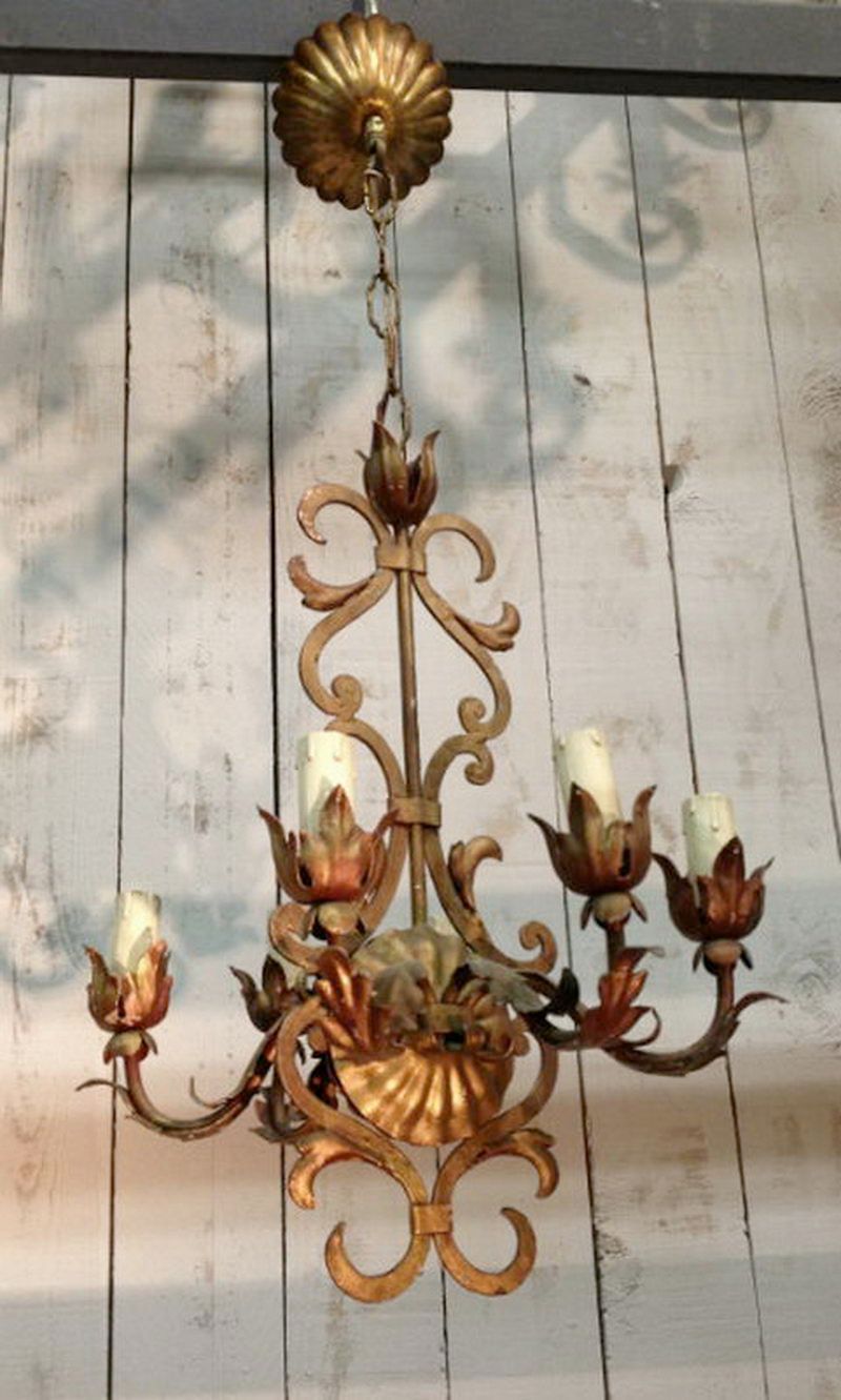 Small gild metal chandelier with 6 lights. Circa 1960