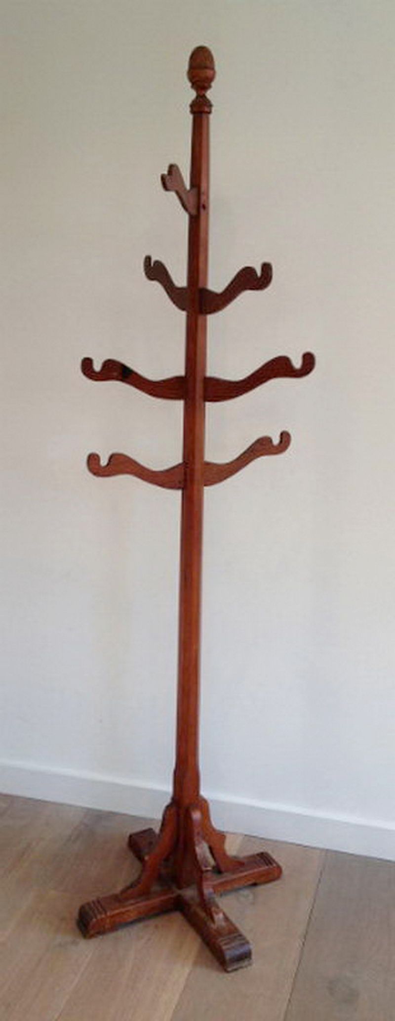 Unusual painted pine coat hanger. Circa 1920.