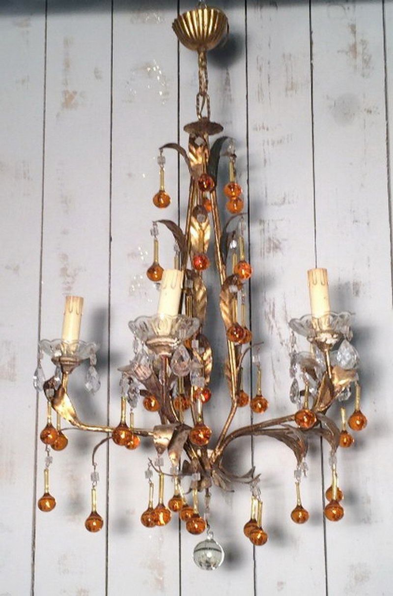 Gild chandelier with amber color cristal drops