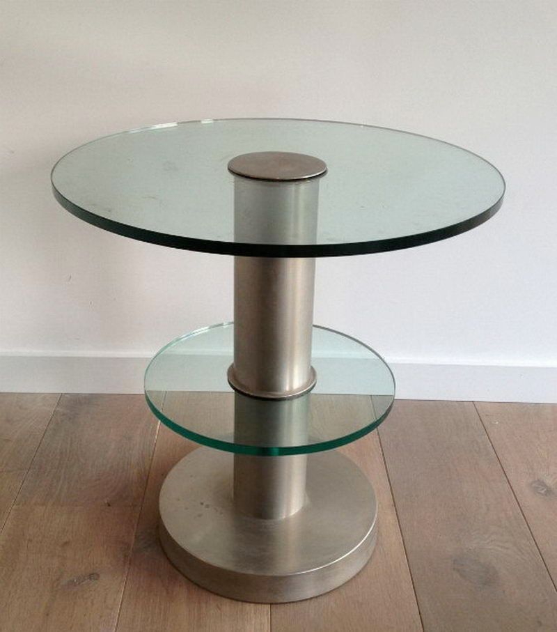 Very nice brushed metal and glass round occasionable table