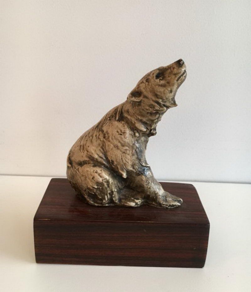 Ceramic bear on exotic wood base