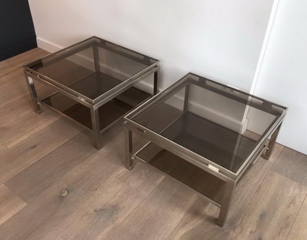 Pair of brushed steel side tables with smoked glass by Guy Lefèvre for Maison Jansen