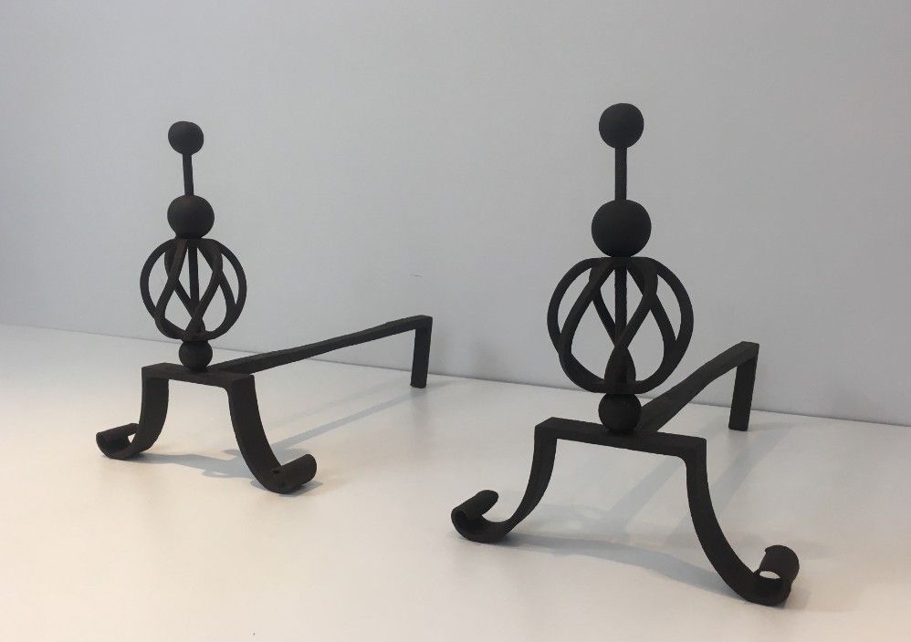 Pair of Wrought Iron Andirons in the Style of Jean Royère