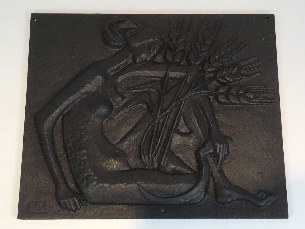 Modernist Cast Iron Fireback Representing a Nude Woman with a Scythe and Ears of Wheat