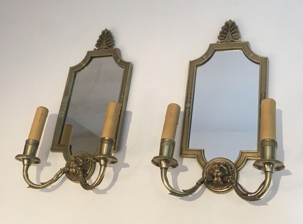 Paire d’Appliques en Miroir et Bronze à têtes de Lions