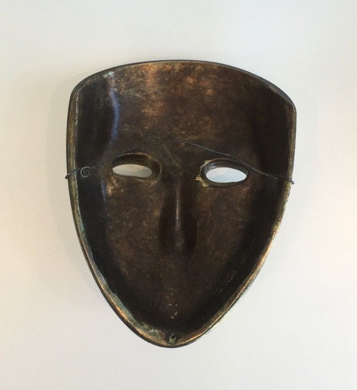 Masque en Céramique Dorée