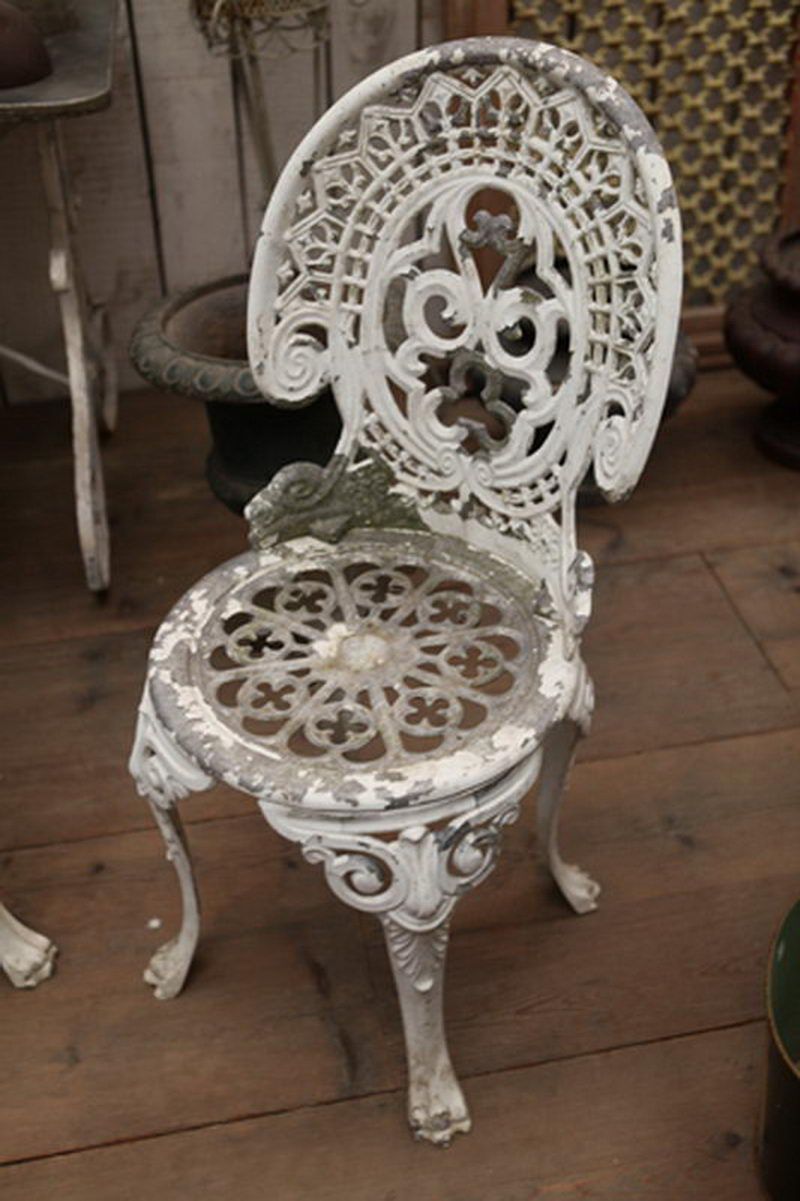 Pair of cast aluminium garden chairs with original paint
