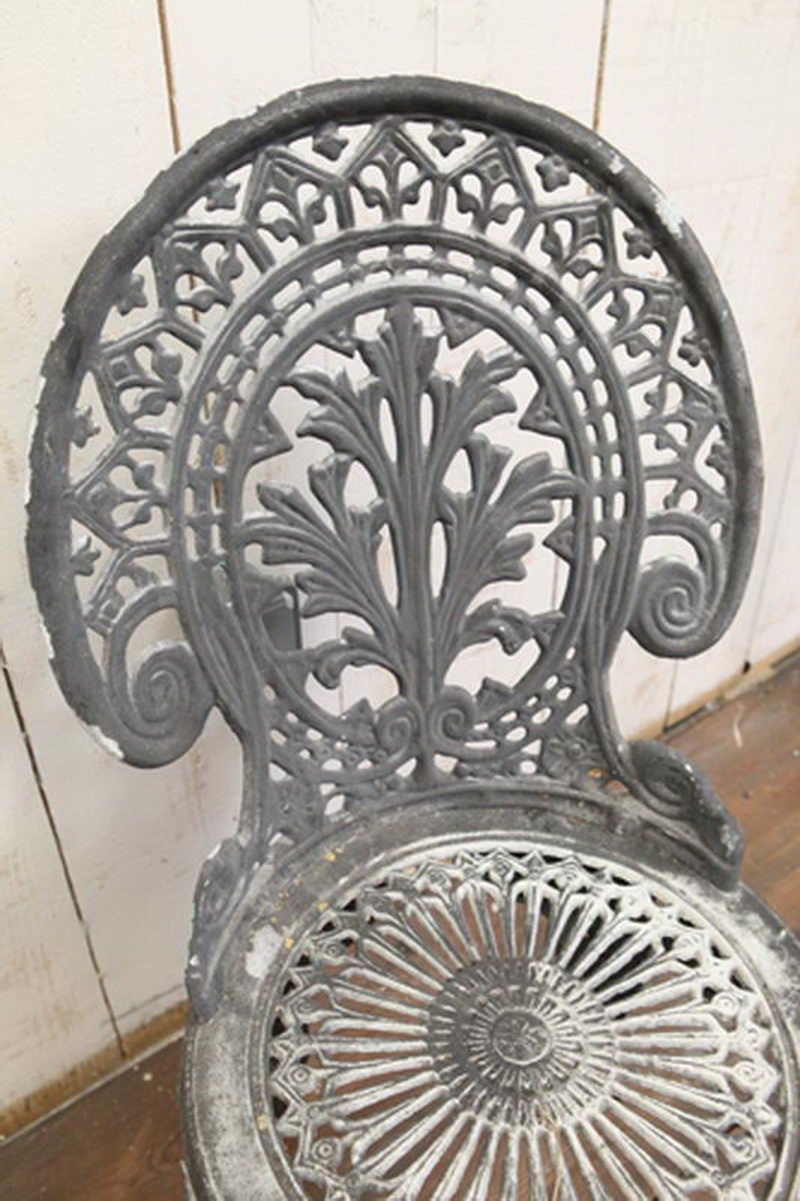 Pair of cast aluminium garden chairs