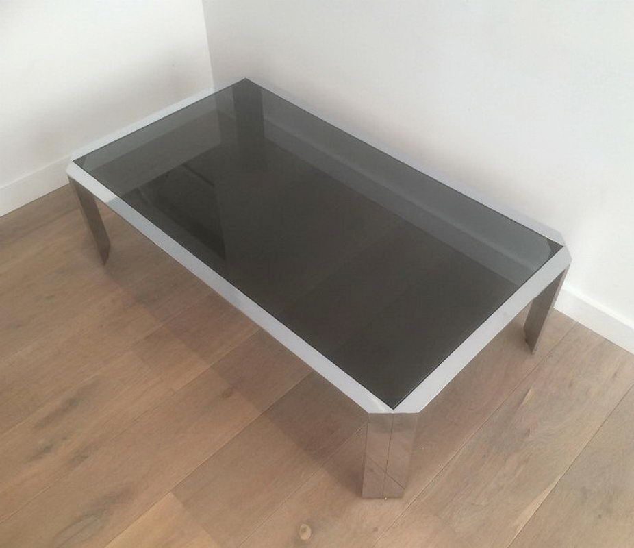 Belle table basse octogonale en chrome à dalle de verre noir