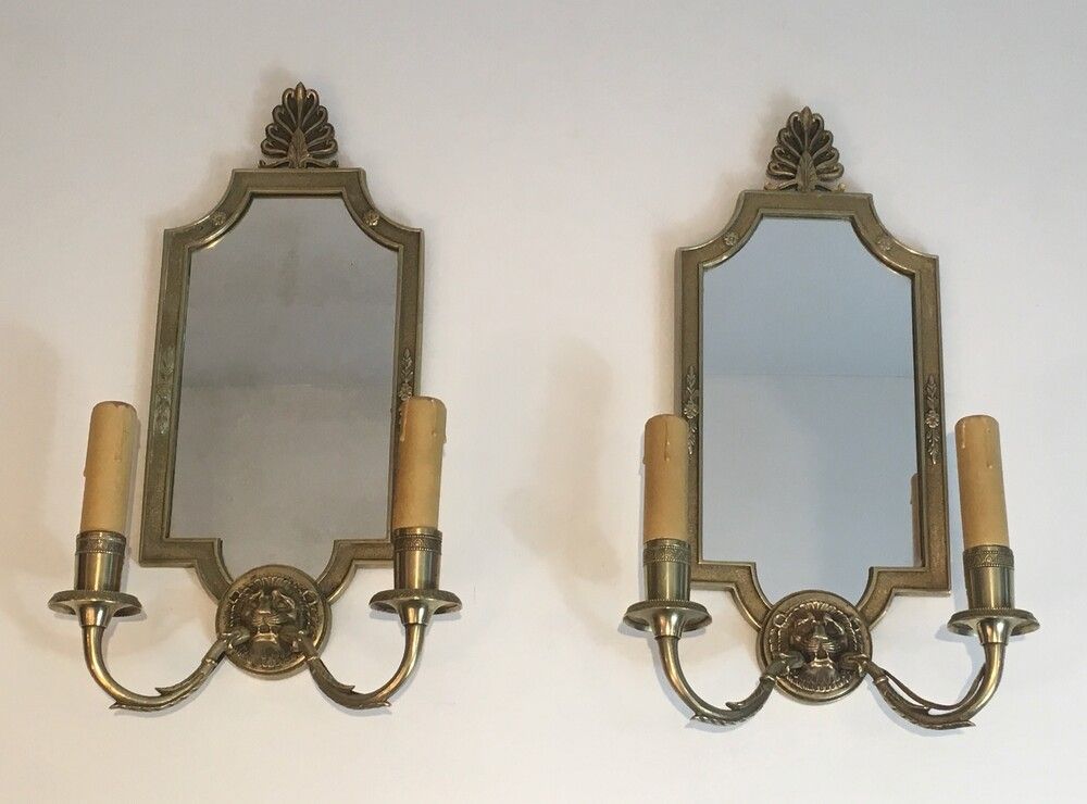 Paire d’Appliques en Miroir et Bronze à têtes de Lions